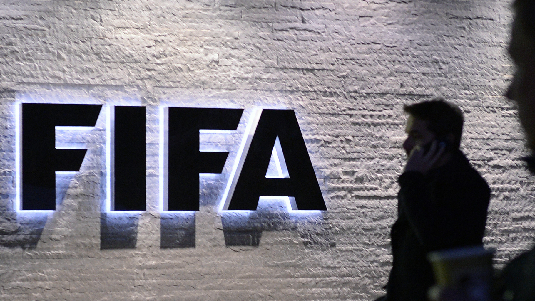 Law enforcement officials arrested two unnamed FIFA officials who are suspected of taking millions of dollars in bribes. (Photo: AP/ File) Law enforcement officials arrested two unnamed FIFA officials who are suspected of taking millions of dollars in bribes. (Photo: AP/ File)